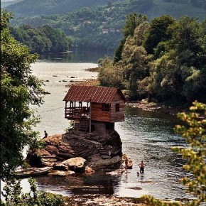 house on river j